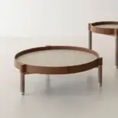 Elegant Cierre1972 Miro coffee table with light stone, rich brown leather and warm satin-finish wooden legs