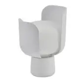 Blom chair, white molded plastic, rounded cocoon shape with curved back wings and cylindrical base, studio lighting.