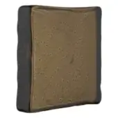 Ceramic tile, bronze and black glaze, rectangular shape with textured edges and mottled surface, handcrafted appearance, neutral background.
