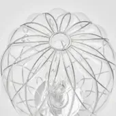 Chrome pinecone pendant light, clear glass panels, spherical cage frame, Edison bulb, retro-modern design, transparent fixture.