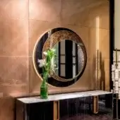 Distinguished Sicis Harper mirror crafted in Ammara ebony with Vetrite glass and a luminous gold-toned metal frame with backlit LED lighting