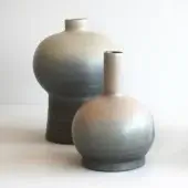 Distinguished Rina Menardi Royal vase crafted from baked clay with a smooth matte gradient finish