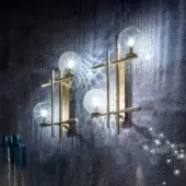 Distinguished Sicis Tris Murano wall lamp crafted in champagne metal with hand-blown Murano glass spheres and subtle blue accents