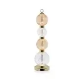 Table lamp, brass and glass, stacked spherical shades with peach tint, vertical design, brushed metal base, modern lighting fixture.