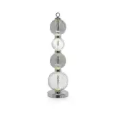 Table lamp, clear textured glass, vertical stacked orbs with chrome accents and ridged swirling patterns, warm LED illumination, circular base.