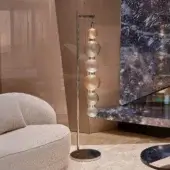 Captivating Sicis Drop floor lamp crafted in satin metal with delicately formed pyrex glass spheres in clear and amber tones