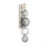Wall sconce, fumé glass and brushed brass, features four cascading spherical globes with striated gray texture and rectangular mounting plate.