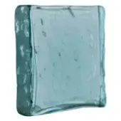 Satin teal blue glass block with textured edges, showcasing a muted hue and subtle inclusions against a white backdrop.
