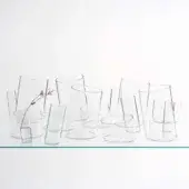 Elegant Glas Italia Bow vase crafted in transparent borosilicate glass with a dynamic inclined silhouette