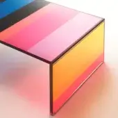 Color-blocked table with horizontal striped tabletop in blue, black, pink, orange, and red, translucent acrylic material, black frame.