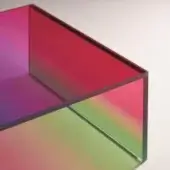 Geometric acrylic sculpture with intersecting planes, purple-to-green gradient, translucent layers, soft lighting, neutral background.