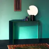 Distinguished Glas Italia Bisel console crafted with five layers of extralight, multichromatic glass in dark transparency with a polished finish
