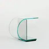 Elegant Glas Italia Ollie side table with extralight glass and a dark green mirrored base exhibiting a polished finish
