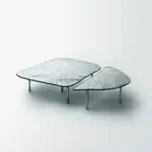 Exceptional Glas Italia Specchio di Venere table with uniquely shaped silvered glass and slender silver-toned metal legs