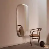 Distinguished Glas Italia Menteur mirror crafted from bronze glass with a meticulously silvered luxurious finish and subtly distorted reflections