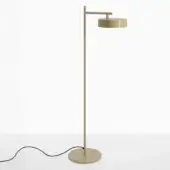Floor lamp, ivory metal, cylindrical stem with horizontal arm and reflector shade, minimalist modern design, black cord, studio shot.