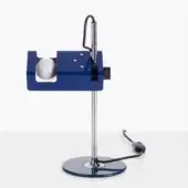 Blue desk lamp, chrome stem, flexible black arm, rectangular head with frosted glass bulb, minimalist design, glossy finish.