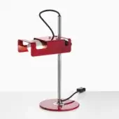 Scarlet red table lamp with chrome accents, featuring a circular base, cylindrical stem, rectangular shade, and flexible black wire arm.