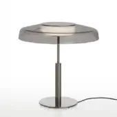 Table lamp, satin black nickel finish, two-tiered brushed metal shade with smokey glass center and cylindrical stem on circular base.