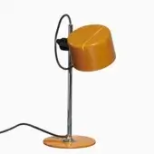 Mini coupe table lamp, mustard yellow, with chrome stem and circular arc, glossy lampshade, black switch, studio shot.