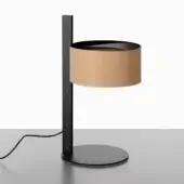 Table lamp, black metal, cylindrical shade with sand leather reflector, minimalist design, visible screws, dark gray surface.