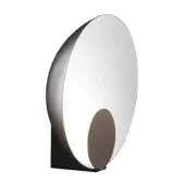 Satin bronze reflector wall lamp with matt black triangular prism base, featuring a circular shape and crescent illumination.