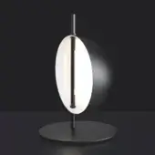 Table lamp, black metal, with a slender stem and dual-tone elliptical shade—matte black hemisphere and bright white oval—emitting diffused light.