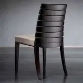 Distinguished Costantini Pietro Charm chair with sculpted beech wood frame and light fabric upholstery