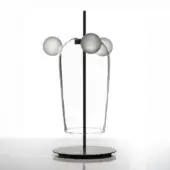 Bartolomeo table lamp, black metal, with three frosted glass spheres suspended on curved acrylic arms in a sculptural arrangement.
