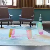 Exclusive Glas Italia Shimmer coffee table crafted in laminated and glued glass with iridescent multichromatic finish and clear glass legs