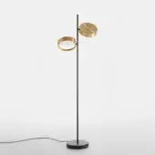 Floor lamp, matte black finish, slender stem with brushed gold light ring and circular accent discs, minimalist modern design.