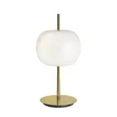 Table lamp, matte white shade, brushed brass stem with circular base and black ring, minimalist modern design.