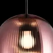 Pendant light, rippled glass, pink to amber gradient, black metal fitting, cylindrical rod, white ceramic socket, E26 base.