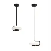 Tratto suspension lights, black metal, cylindrical mounts with slender rods and oblong white shades, one curved, minimalist design.