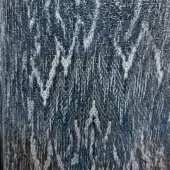 Woven textile with dark blue and light gray threads forming a dynamic, irregular pattern and slightly crinkled surface texture.