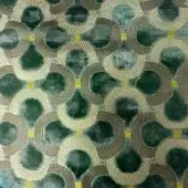 Geometric textile sample, dark teal and beige, features circular patterns with yellow accents, woven with a plush velvety texture.