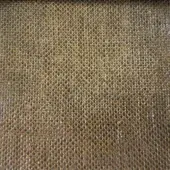 Woven fabric texture, warm gold and brown tones, dense grid pattern with matte finish; sample labeled “co1006 col. 35” on gray background.