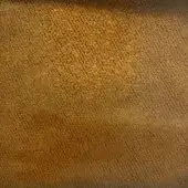 Fibrous texture sample in golden-brown, displaying a granular surface with diagonal ridges and matte finish, labeled “co1010 col. 612”.