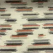 Geometric textile sample with horizontal rectangles in black, orange, and gray on a cream background, labeled “co1021 col.”