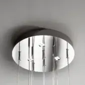 Circular mirrored light fixture, matte gray canopy, chrome rods with clear glass globes, minimalist modern design, studio lighting.
