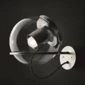 Nickel plated wall sconce with downward-facing clear glass globe and dark gray cylindrical shade, featuring brushed metal hardware.