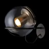 Wall-mounted light, satin gold and anodic bronze, featuring a smoky gray globe partially covering a cylindrical brushed bronze light source.