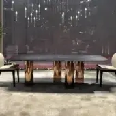 Exceptional Reflex Signore degli Anelli table with dark patterned Marble glass and reflective copper-toned metallic cylindrical legs crafted with a smooth finish