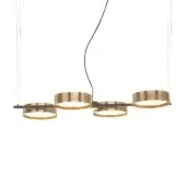 Linear chandelier, satin brass finish, with four cylindrical lampshades and flared rings suspended from a dark horizontal bar.
