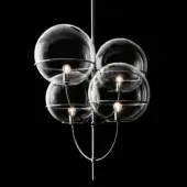 Chandelier, chromium plated, four-tier design with spherical glass globes and Edison bulbs, studio shot on black background.