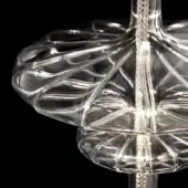 Glass pendant light, clear transparent finish, dual spherical forms with radiating curved ridges and visible braided cord detail.