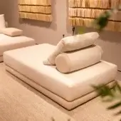 Exclusive Verzelloni Lands daybed in light beige woven fabric with recessed black lacquered beech wood feet