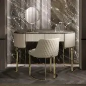 Elegant DV Home Collection Soho vanity with light beige leather upholstery and dark glossy wood drawer fronts