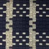 Rectangular area rug with alternating navy blue and beige vertical bands, featuring a textured jute or sisal rope-like weave and dense solid sections.