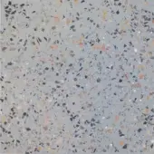Terrazzo flooring texture with light gray base and dense aggregate of beige, tan, brown, gray, and white irregularly shaped stone fragments.